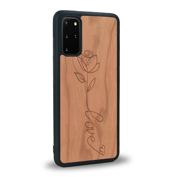 Coque de protection en bois véritable fabriquée en France pour Samsung S20+ sur le thème de la fête des mères avec un motif représentant une fleur dont la tige forme le mot "love"