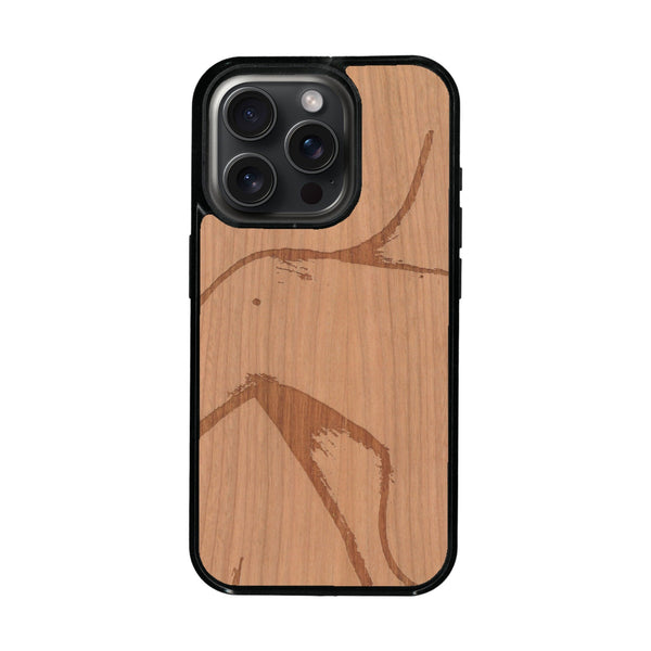 Coque de protection en bois véritable fabriquée en France pour iPhone 16 Pro Max représentant une silhouette féminine dessinée à la main par l'artiste Maud Dabs