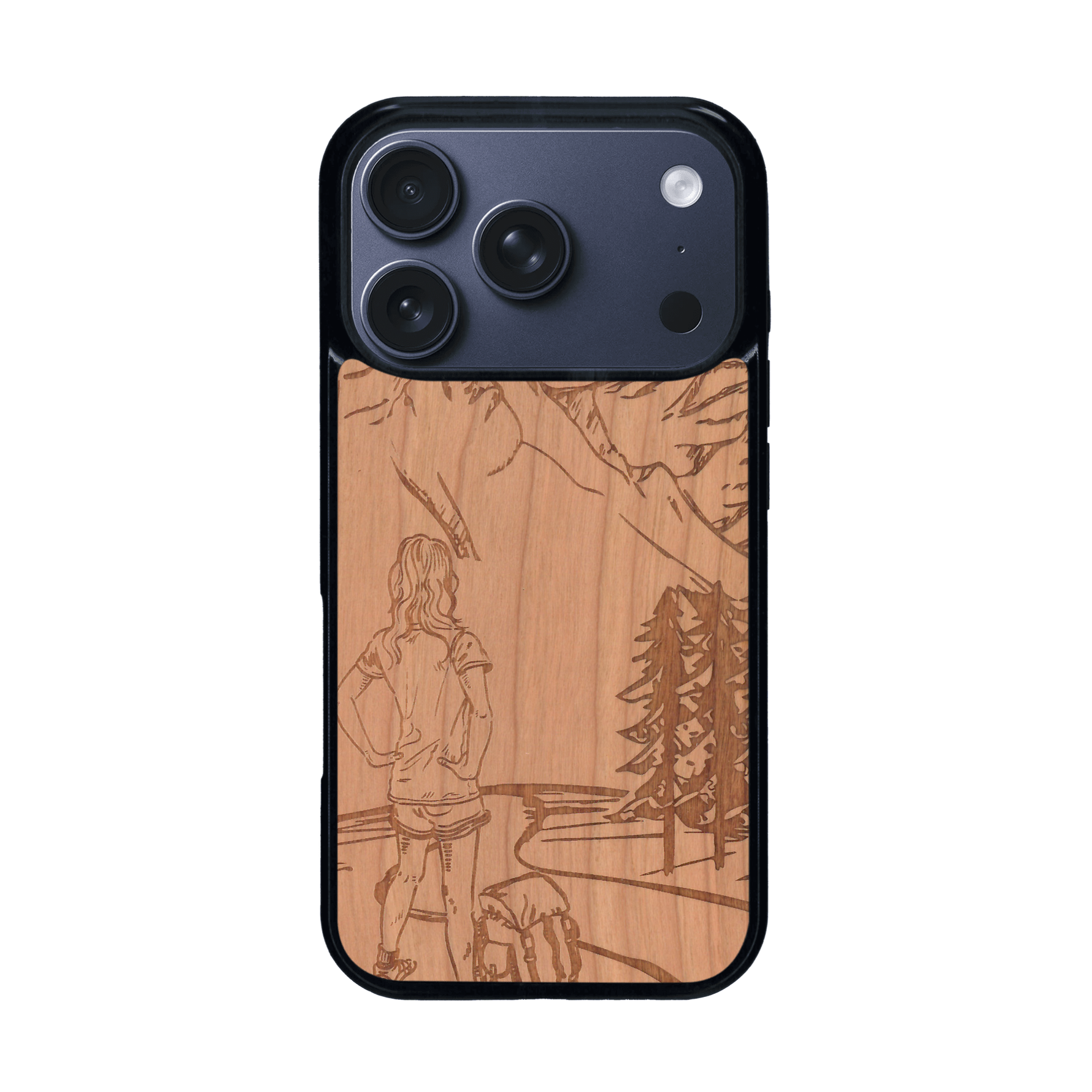 Coque de protection en bois véritable fabriquée en France pour iPhone 17 Pro sur le thème de la randonnée en montagne et de l'aventure avec une gravure représentant une femme de dos face à un paysage de nature