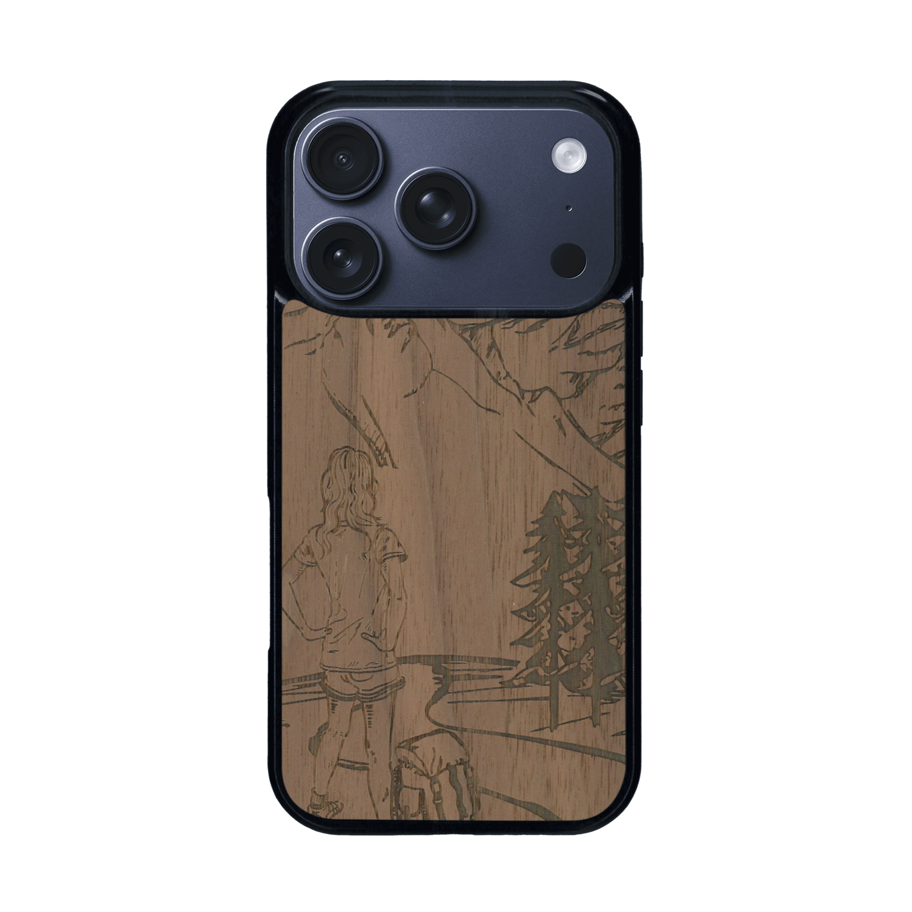 Coque de protection en bois véritable fabriquée en France pour iPhone 17 Pro sur le thème de la randonnée en montagne et de l'aventure avec une gravure représentant une femme de dos face à un paysage de nature