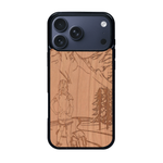 Coque de protection en bois véritable fabriquée en France pour iPhone 17 Pro Max sur le thème de la randonnée en montagne et de l'aventure avec une gravure représentant une femme de dos face à un paysage de nature