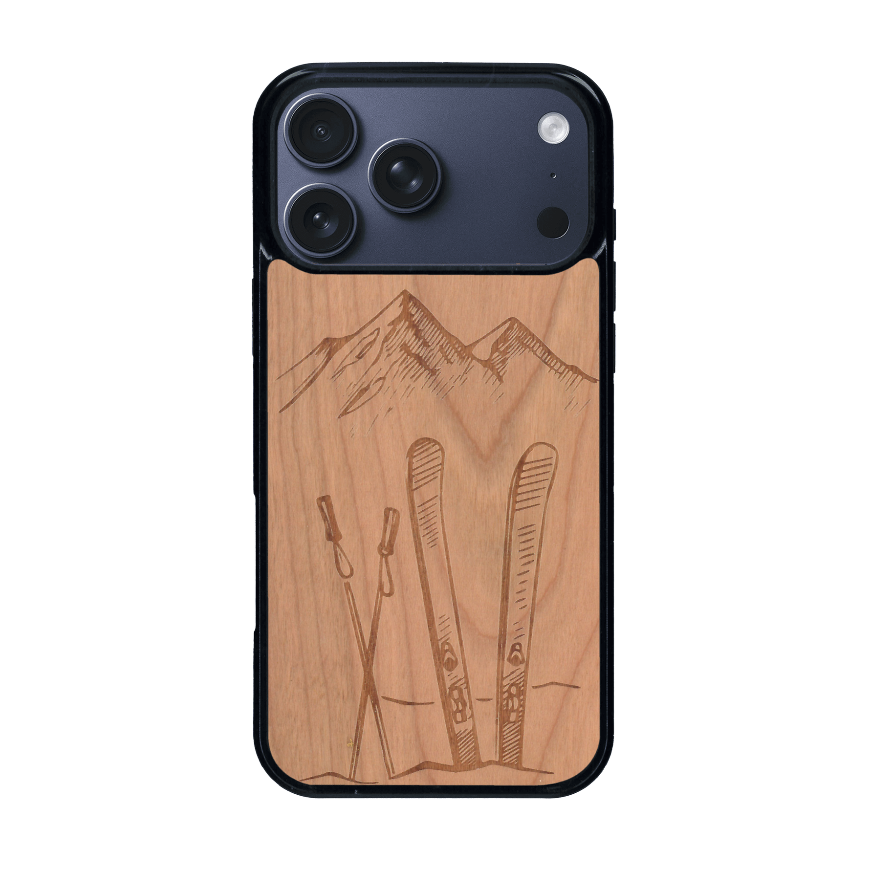 Coque de protection en bois véritable fabriquée en France pour iPhone 17 Pro Max sur le thème de la montagne, du ski et de la neige avec un motif représentant une paire de ski plantée dans la neige avec en fond des montagnes enneigées