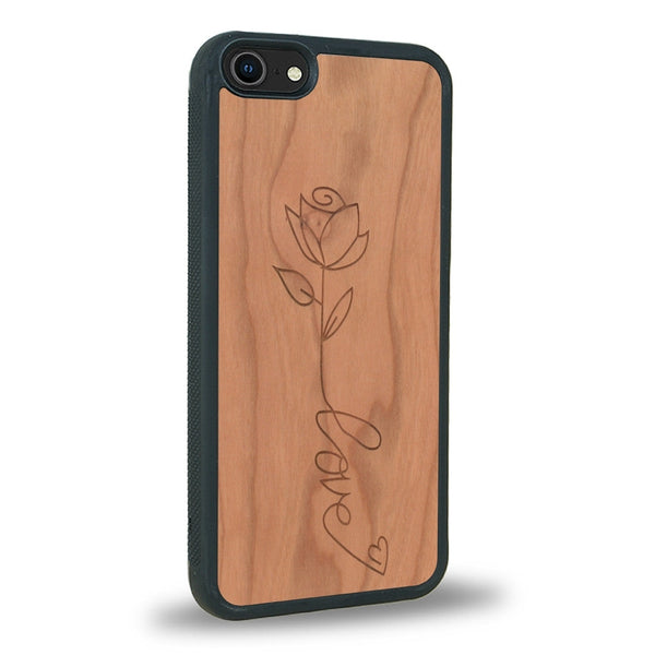 Coque de protection en bois véritable fabriquée en France pour iPhone SE 2020 sur le thème de la fête des mères avec un motif représentant une fleur dont la tige forme le mot "love"