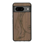Coque de protection en bois véritable fabriquée en France pour Google Pixel 7A représentant une silhouette féminine épurée de type line art en collaboration avec l'artiste Maud Dabs