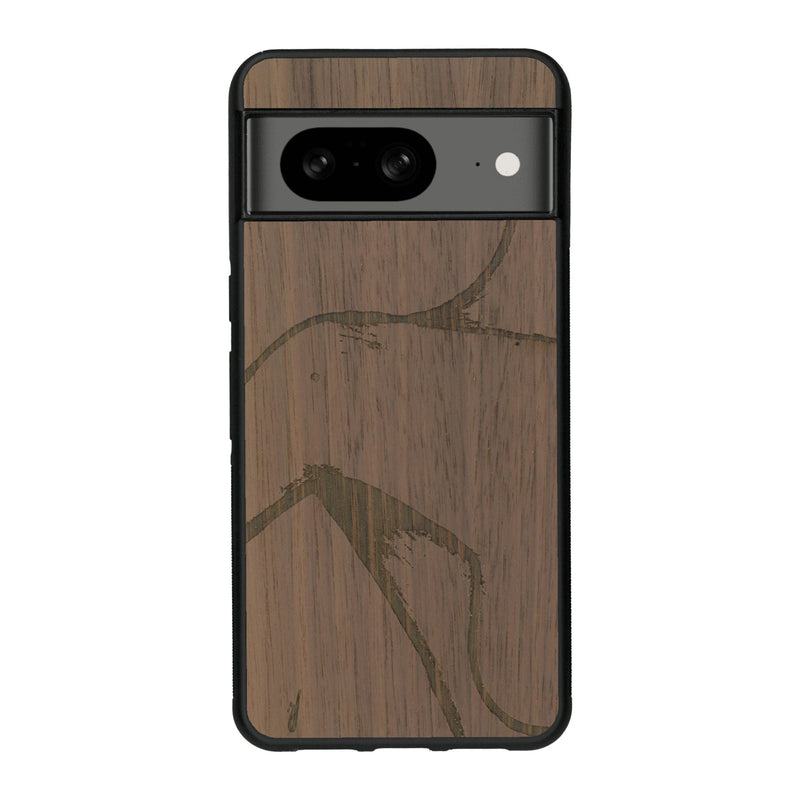 Coque de protection en bois véritable fabriquée en France pour Google Pixel 8 représentant une silhouette féminine dessinée à la main par l'artiste Maud Dabs