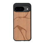 Coque de protection en bois véritable fabriquée en France pour Google Pixel 8pro représentant une silhouette féminine dessinée à la main par l'artiste Maud Dabs