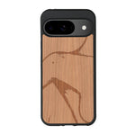 Coque de protection en bois véritable fabriquée en France pour Google Pixel 9 représentant une silhouette féminine dessinée à la main par l'artiste Maud Dabs