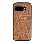 Coque de protection en bois véritable fabriquée en France pour Google Pixel 9A avec un motif abstrait représentant les mouvements de l'eau