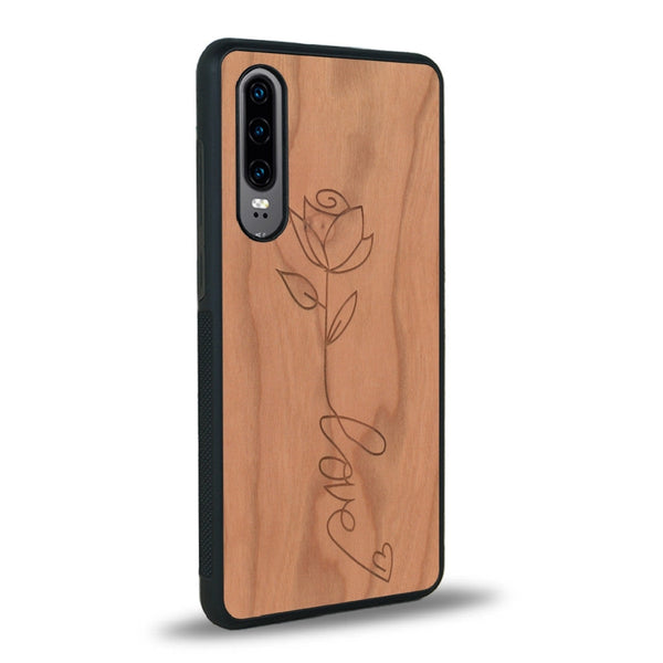 Coque de protection en bois véritable fabriquée en France pour Huawei P30 sur le thème de la fête des mères avec un motif représentant une fleur dont la tige forme le mot "love"