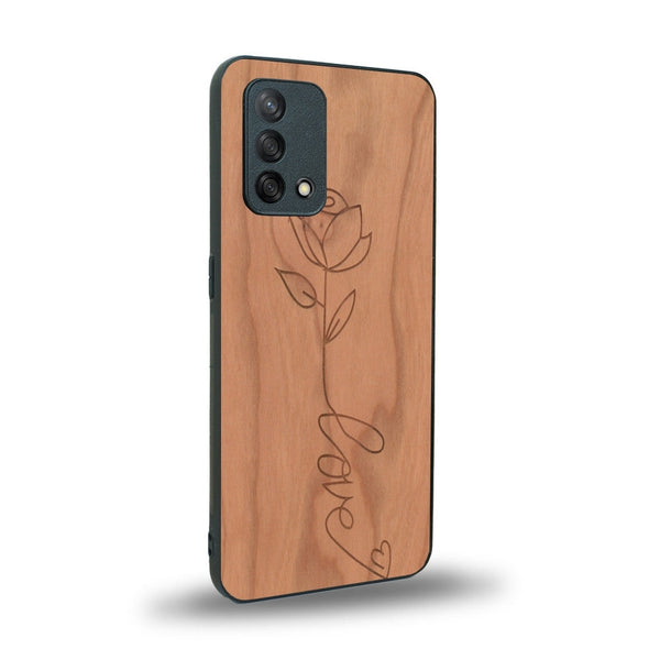 Coque de protection en bois véritable fabriquée en France pour Oppo A74 4G sur le thème de la fête des mères avec un motif représentant une fleur dont la tige forme le mot "love"
