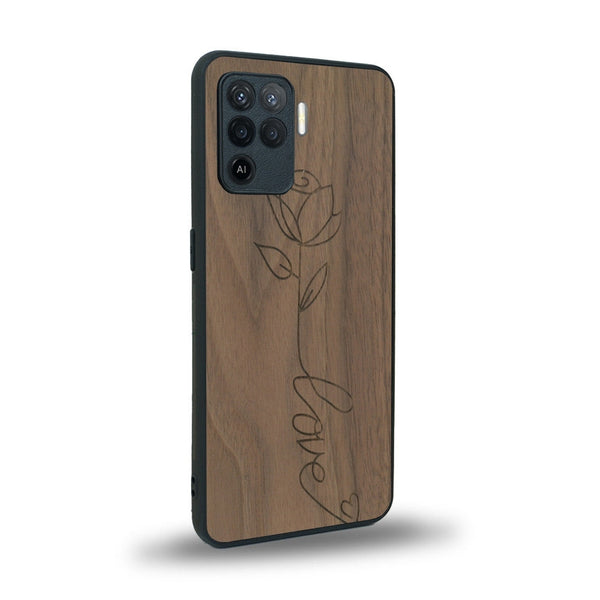 Coque de protection en bois véritable fabriquée en France pour Oppo A94 sur le thème de la fête des mères avec un motif représentant une fleur dont la tige forme le mot "love"