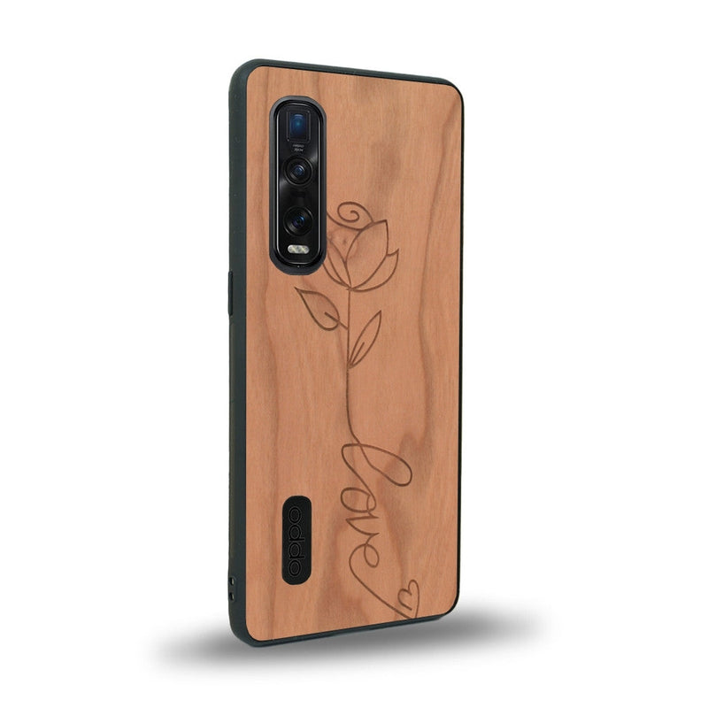 Coque de protection en bois véritable fabriquée en France pour Oppo Find X2 Pro sur le thème de la fête des mères avec un motif représentant une fleur dont la tige forme le mot "love"