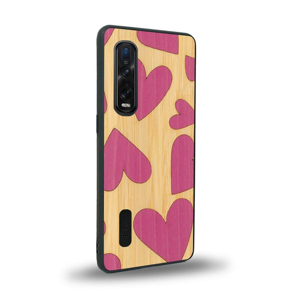 Coque de protection en bois véritable fabriquée en France pour Oppo Find X2 Pro alliant plusieurs essences de bois pour représenter des coeurs pour les amoureux