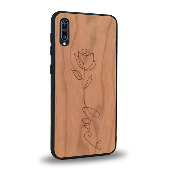 Coque de protection en bois véritable fabriquée en France pour Samsung A50 sur le thème de la fête des mères avec un motif représentant une fleur dont la tige forme le mot "love"