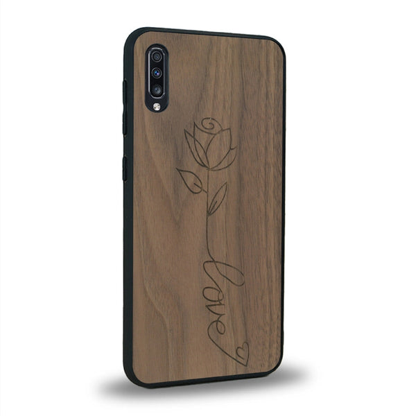 Coque de protection en bois véritable fabriquée en France pour Samsung A70 sur le thème de la fête des mères avec un motif représentant une fleur dont la tige forme le mot "love"