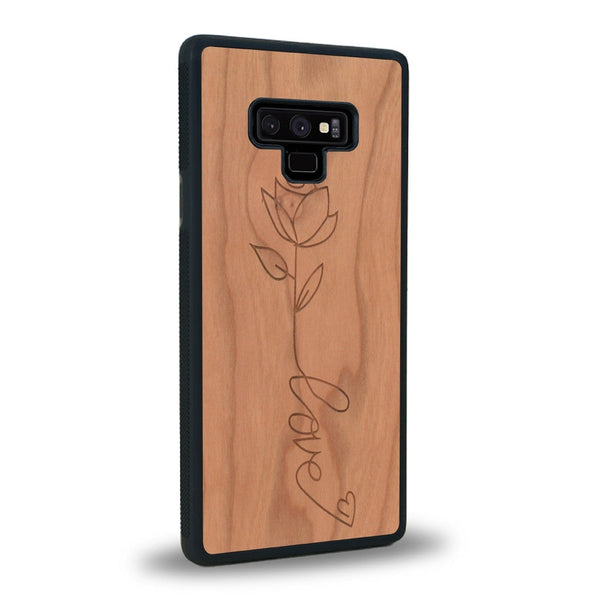 Coque de protection en bois véritable fabriquée en France pour Samsung Note 9 sur le thème de la fête des mères avec un motif représentant une fleur dont la tige forme le mot "love"