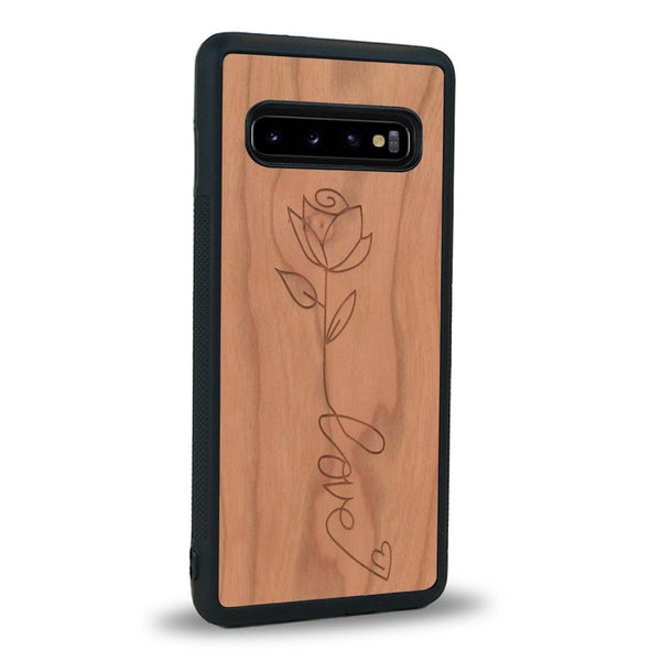 Coque de protection en bois véritable fabriquée en France pour Samsung S10 sur le thème de la fête des mères avec un motif représentant une fleur dont la tige forme le mot "love"