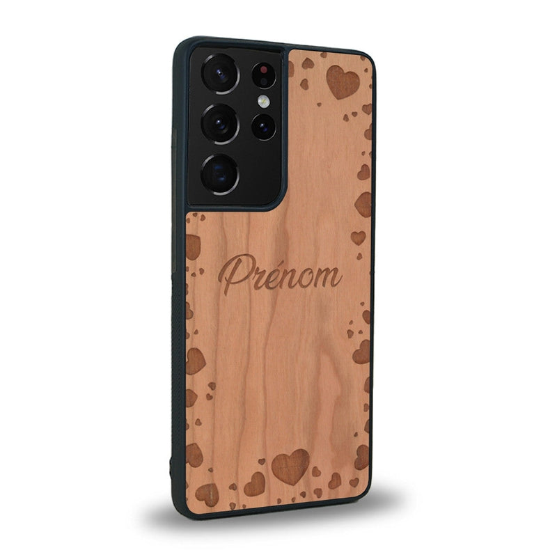 Coque de protection en bois véritable fabriquée en France pour Samsung S21 Ultra sur le thème de la fête des mères avec un motif représentant des coeurs et des feuilles
