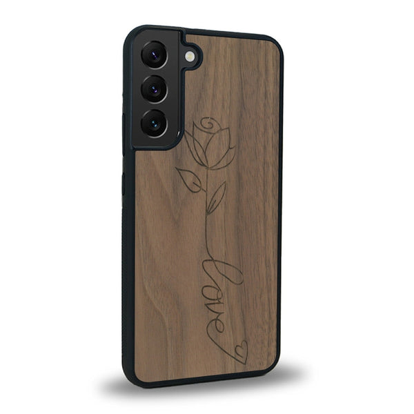 Coque de protection en bois véritable fabriquée en France pour Samsung S21+ sur le thème de la fête des mères avec un motif représentant une fleur dont la tige forme le mot "love"