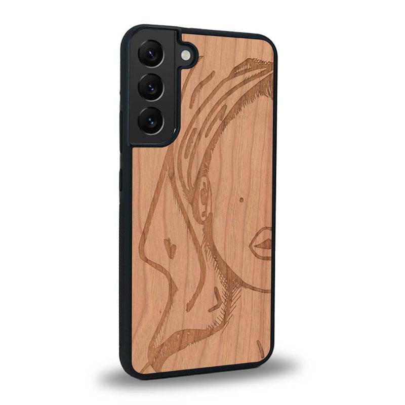 Coque de protection en bois véritable fabriquée en France pour Samsung S24+ représentant une silhouette féminine épurée de type line art en collaboration avec l'artiste Maud Dabs