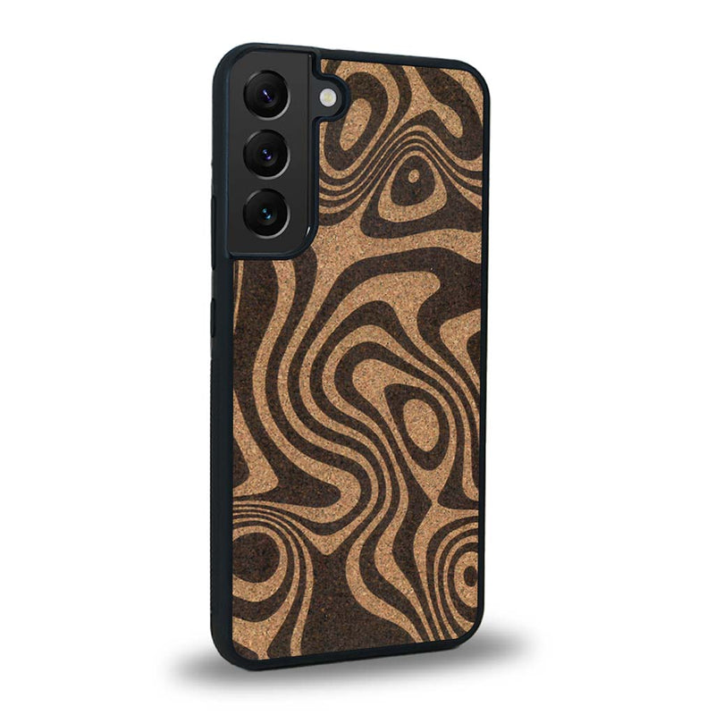 Coque de protection en bois véritable fabriquée en France pour Samsung S24+ avec un motif abstrait représentant les mouvements de l'eau