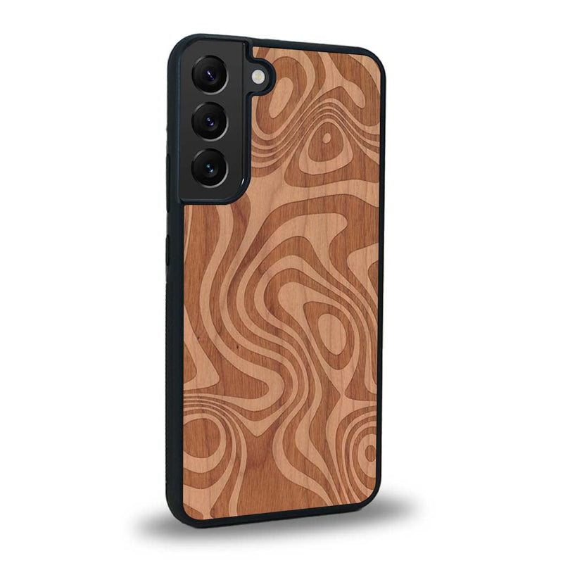 Coque de protection en bois véritable fabriquée en France pour Samsung S24+ avec un motif abstrait représentant les mouvements de l'eau