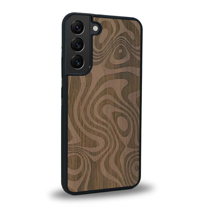 Coque de protection en bois véritable fabriquée en France pour Samsung S24+ avec un motif abstrait représentant les mouvements de l'eau