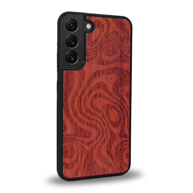 Coque de protection en bois véritable fabriquée en France pour Samsung S24+ avec un motif abstrait représentant les mouvements de l'eau