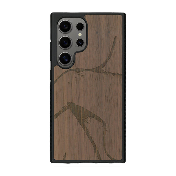 Coque de protection en bois véritable fabriquée en France pour Samsung S25 Ultra représentant une silhouette féminine dessinée à la main par l'artiste Maud Dabs