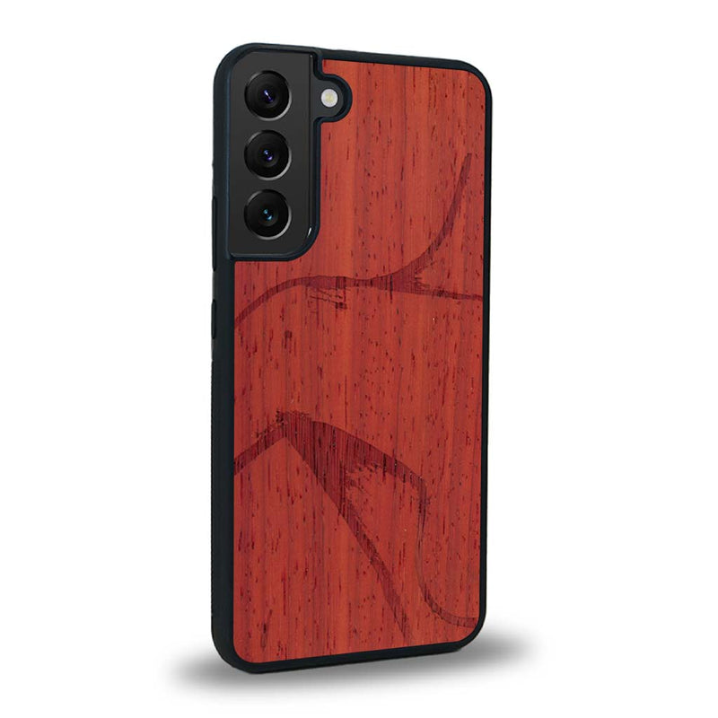 Coque de protection en bois véritable fabriquée en France pour Samsung S25+ représentant une silhouette féminine dessinée à la main par l'artiste Maud Dabs