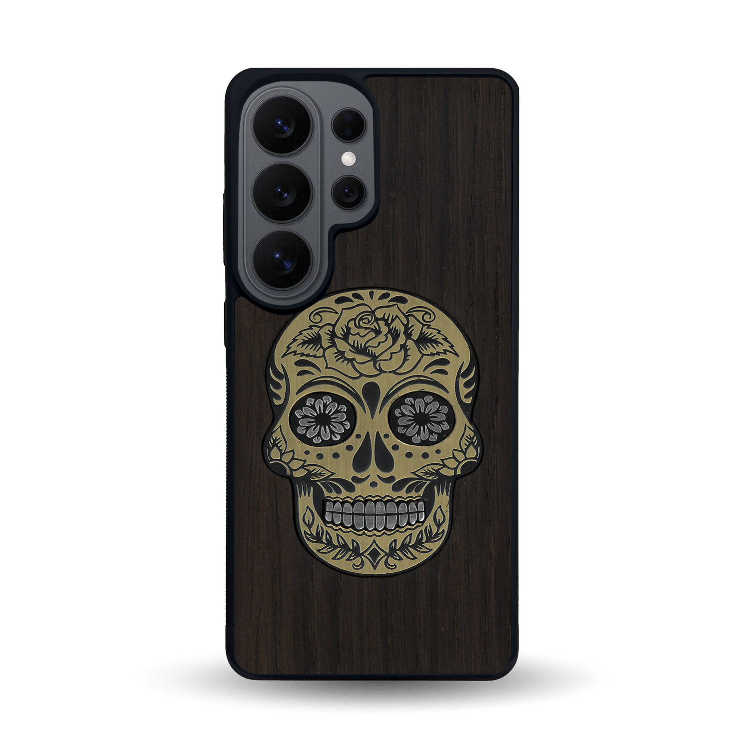 Coque de protection en bois véritable fabriquée en France pour Samsung S26 Ultra alliant du chêne fumé avec du métal argenté et doré représentant une tête de mort mexicaine sur le thème Dia de los Muertos