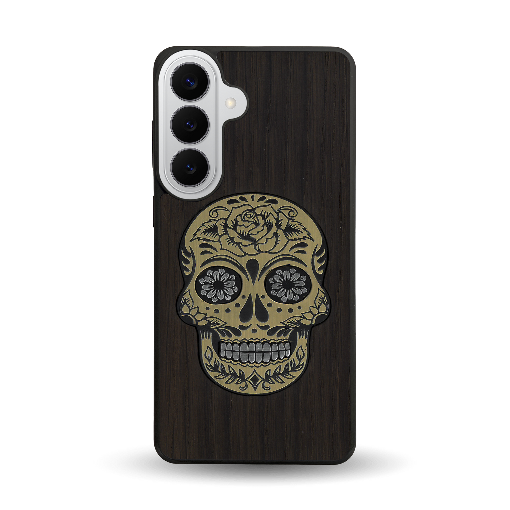 Coque de protection en bois véritable fabriquée en France pour Samsung S26+ alliant du chêne fumé avec du métal argenté et doré représentant une tête de mort mexicaine sur le thème Dia de los Muertos