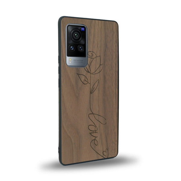 Coque de protection en bois véritable fabriquée en France pour Vivo X60 sur le thème de la fête des mères avec un motif représentant une fleur dont la tige forme le mot "love"