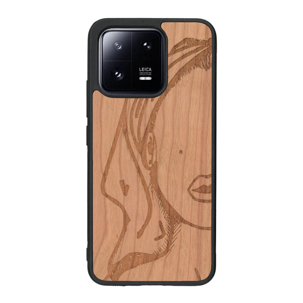 Coque de protection en bois véritable fabriquée en France pour Xiaomi Mi 13 représentant une silhouette féminine épurée de type line art en collaboration avec l'artiste Maud Dabs