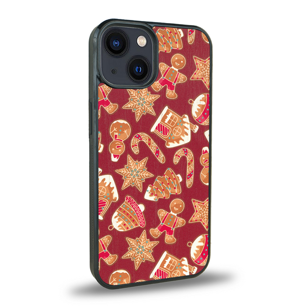 Coque de protection en bois véritable fabriquée en France pour iPhone 14 + MagSafe® sur le thème de noël et de l'hiver avec un motif représentant un bonhomme de pain d'épice