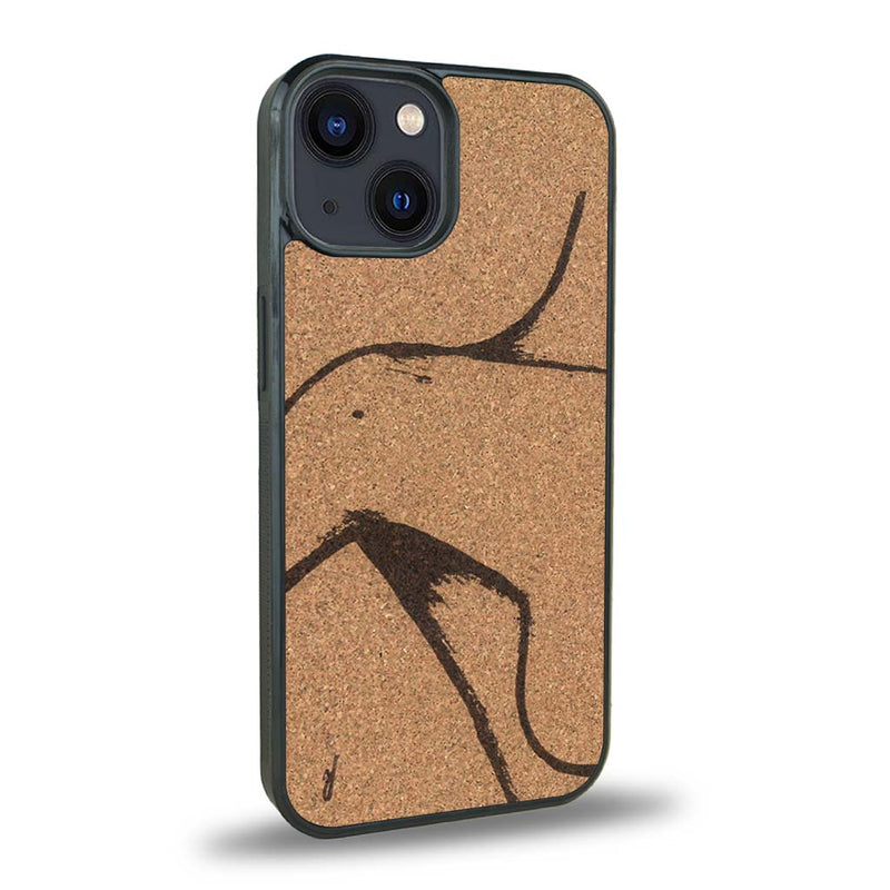 Coque de protection en bois véritable fabriquée en France pour iPhone 15 représentant une silhouette féminine dessinée à la main par l'artiste Maud Dabs