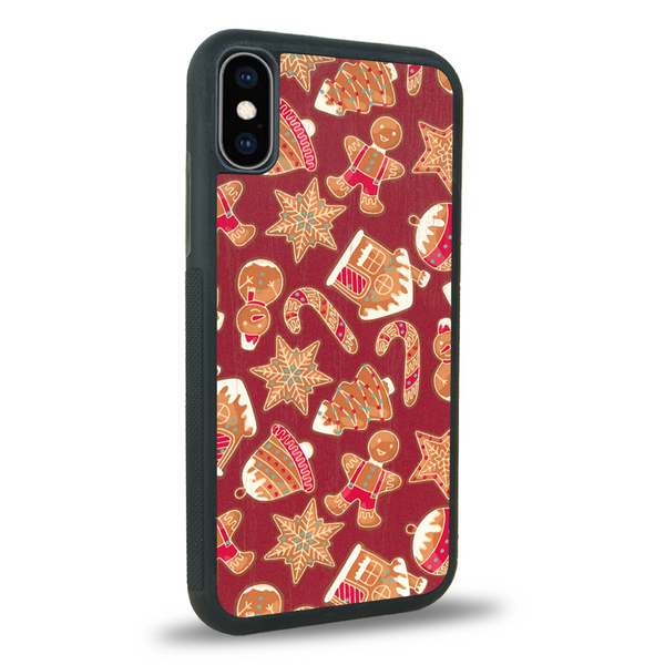 Coque de protection en bois véritable fabriquée en France pour iPhone XS Max sur le thème de noël et de l'hiver avec un motif représentant un bonhomme de pain d'épice