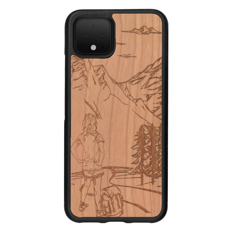 Coque de protection en bois véritable fabriquée en France pour Google Pixel 4 sur le thème de la randonnée en montagne et de l'aventure avec une gravure représentant une femme de dos face à un paysage de nature