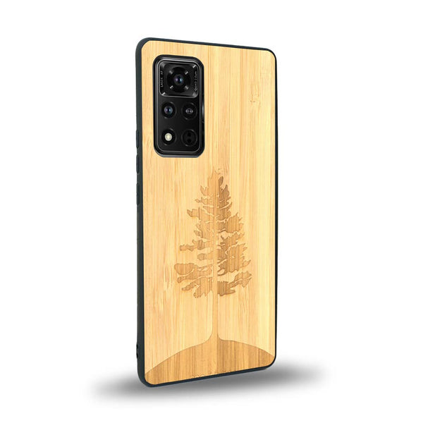 Coque de protection en bois véritable fabriquée en France pour Honor V40 sur le thème de la nature, de la fôret et de l'écoresponsabilité avec une gravure représentant un arbre 