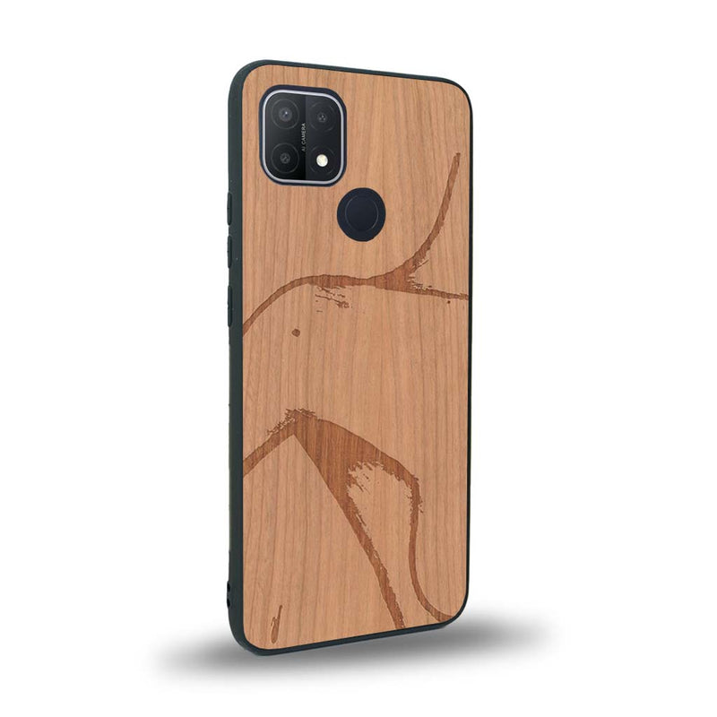 Coque de protection en bois véritable fabriquée en France pour Oppo A15 représentant une silhouette féminine dessinée à la main par l'artiste Maud Dabs