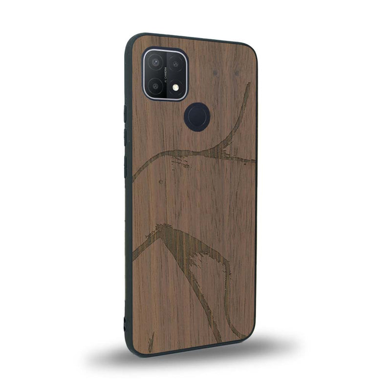 Coque de protection en bois véritable fabriquée en France pour Oppo A15 représentant une silhouette féminine dessinée à la main par l'artiste Maud Dabs