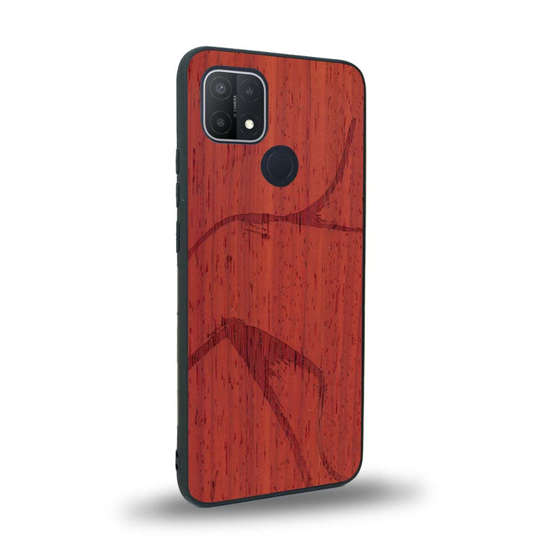 Coque de protection en bois véritable fabriquée en France pour Oppo A15 représentant une silhouette féminine dessinée à la main par l'artiste Maud Dabs