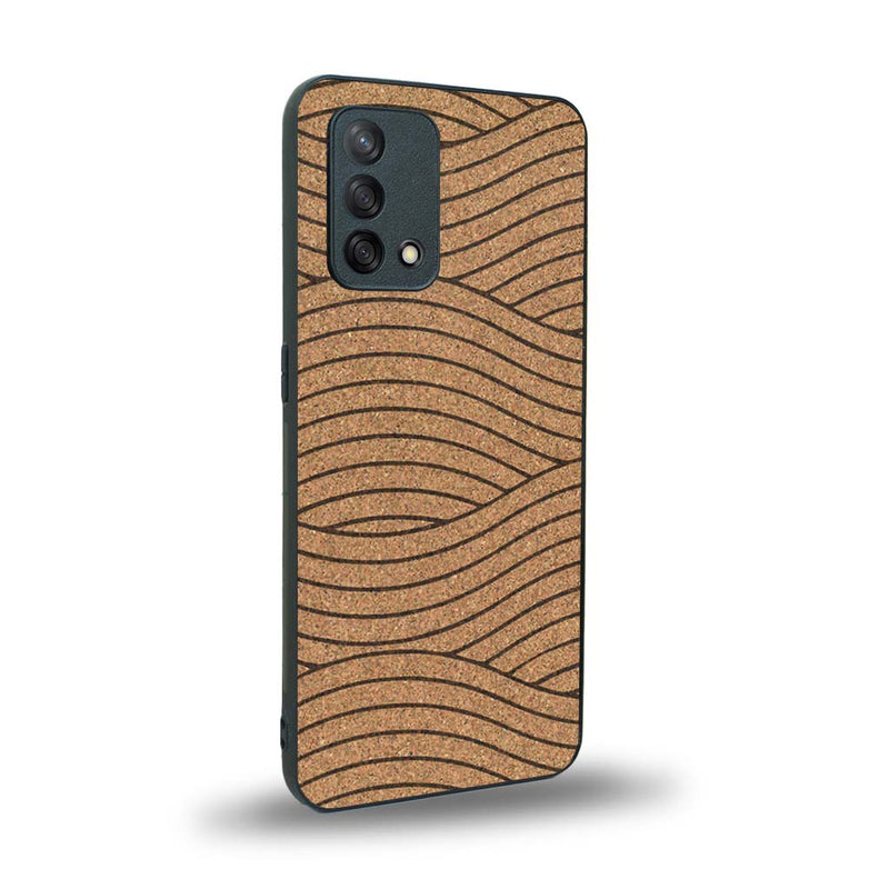 Coque de protection en bois véritable fabriquée en France pour Oppo A74 4G avec un motif moderne et minimaliste sur le thème waves et wavy représentant les vagues de l'océan