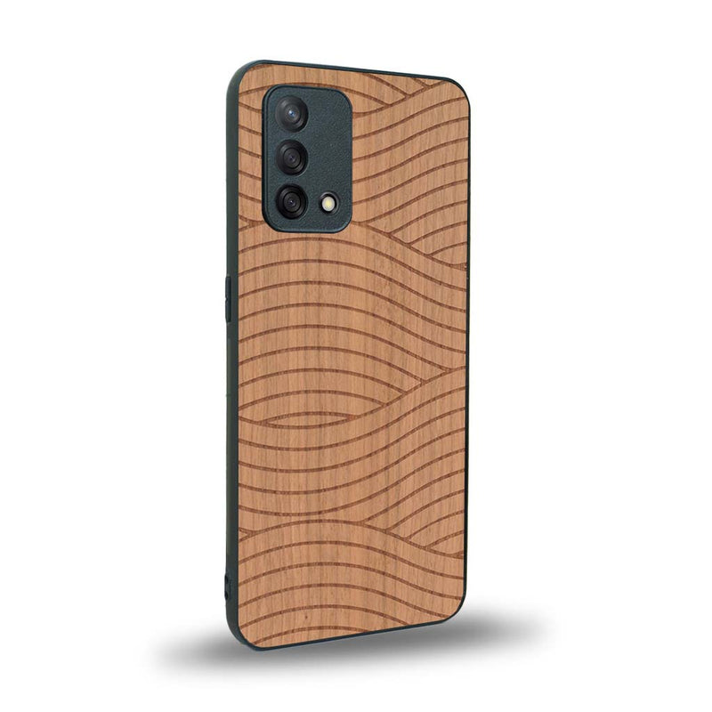 Coque de protection en bois véritable fabriquée en France pour Oppo A74 4G avec un motif moderne et minimaliste sur le thème waves et wavy représentant les vagues de l'océan