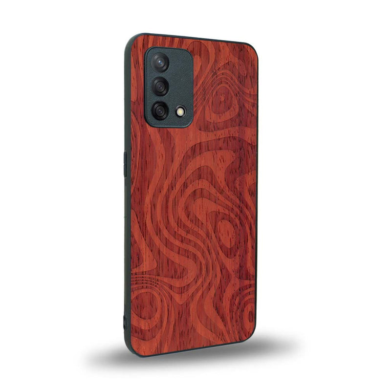 Coque de protection en bois véritable fabriquée en France pour Oppo A74 4G avec un motif abstrait représentant les mouvements de l'eau