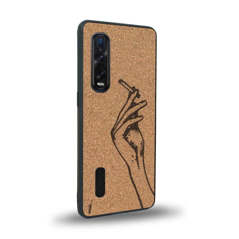 Coque de protection en bois véritable fabriquée en France pour Oppo Find X2 Pro représentant une main de femme tenant une cigarette de type line art en collaboration avec l'artiste Maud Dabs
