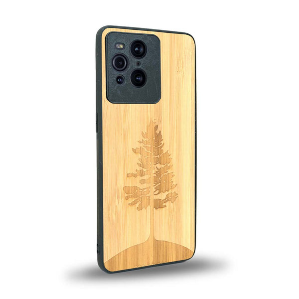 Coque de protection en bois véritable fabriquée en France pour Oppo Find X3 Pro sur le thème de la nature, de la fôret et de l'écoresponsabilité avec une gravure représentant un arbre 