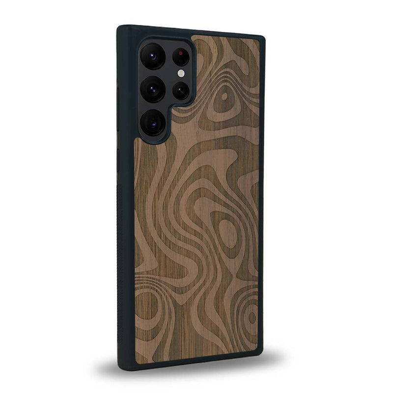 Coque de protection en bois véritable fabriquée en France pour Samsung S23 Ultra avec un motif abstrait représentant les mouvements de l'eau