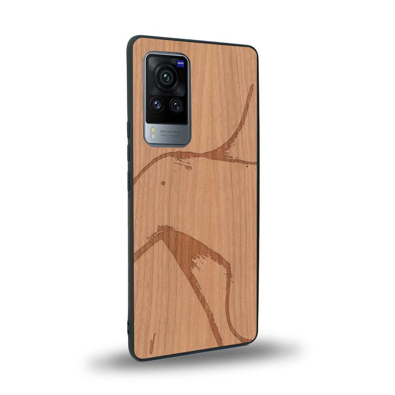 Coque de protection en bois véritable fabriquée en France pour Vivo X60 représentant une silhouette féminine dessinée à la main par l'artiste Maud Dabs