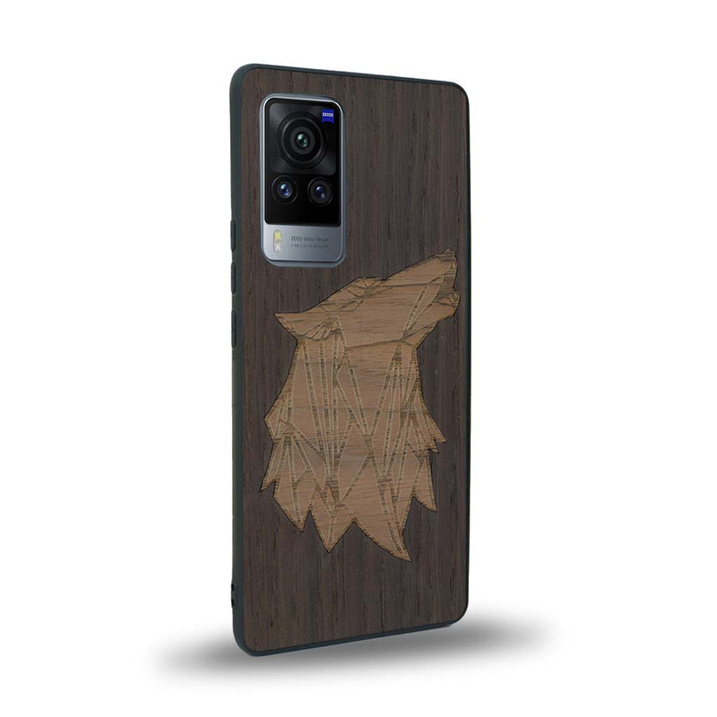 Coque de protection en bois véritable fabriquée en France pour Vivo X60 alliant du chêne fumé et du noyer représentant une tête de loup géométrique de profil sur le thème des animaux et de la nature